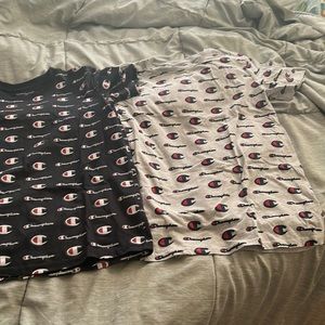 Champion t-shirts one is black and red the other is grey and red